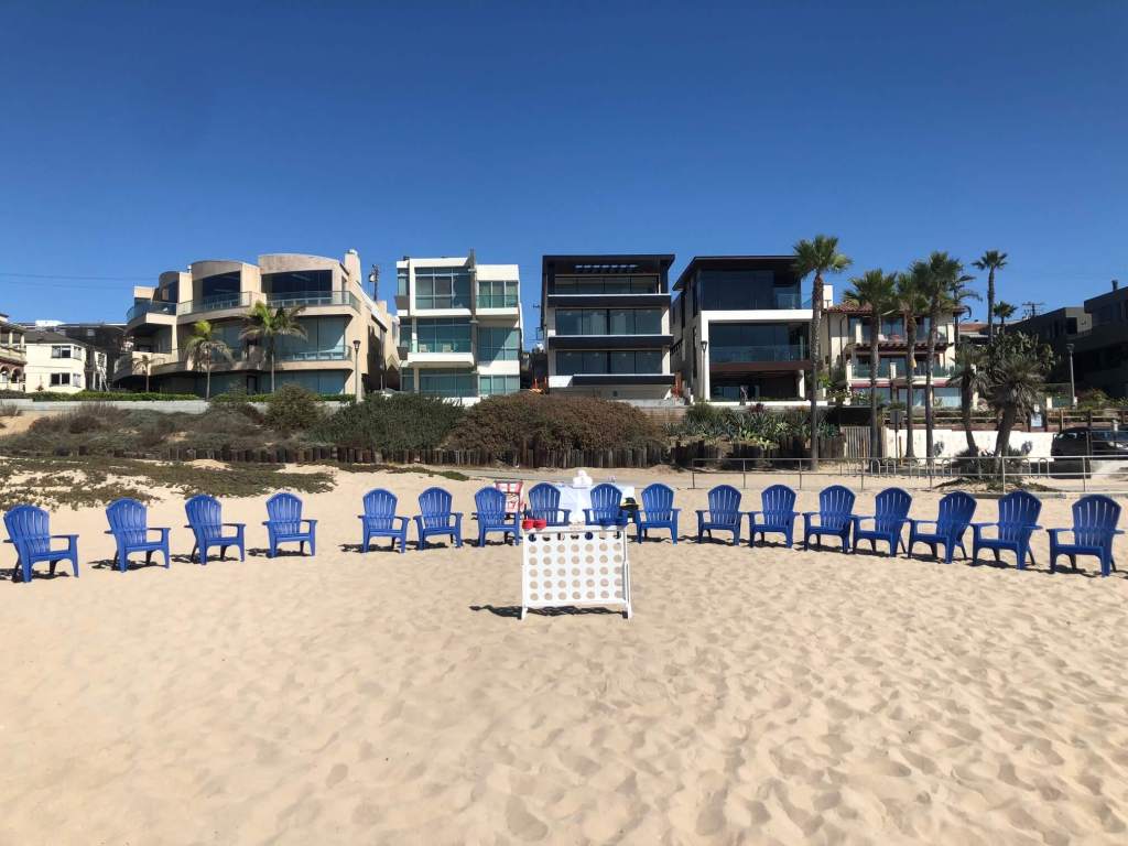 beach chairs lined up on beach