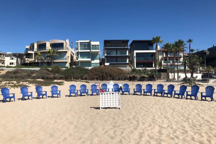 beach chairs lined up on beach