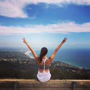 girl on Hike giving peace fingers