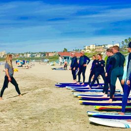 a group of people on a beach