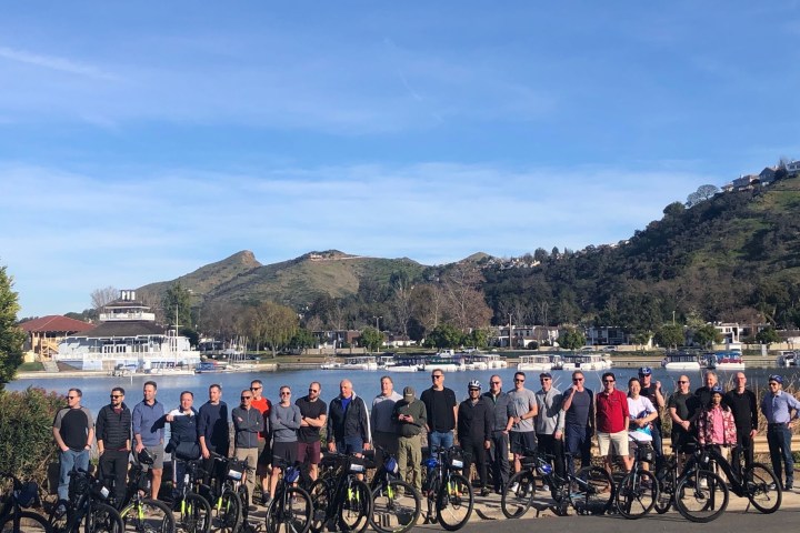a group of people standing in front of a crowd