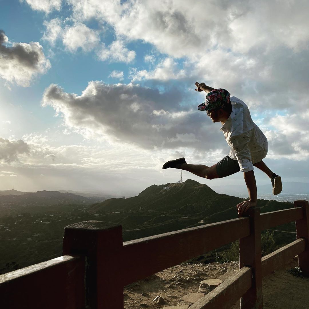Bikes and Hikes LA Hollywood Sign Hike a person riding on top of a wooden fence