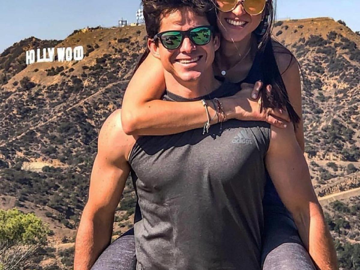 guests in front of the hollywood sign