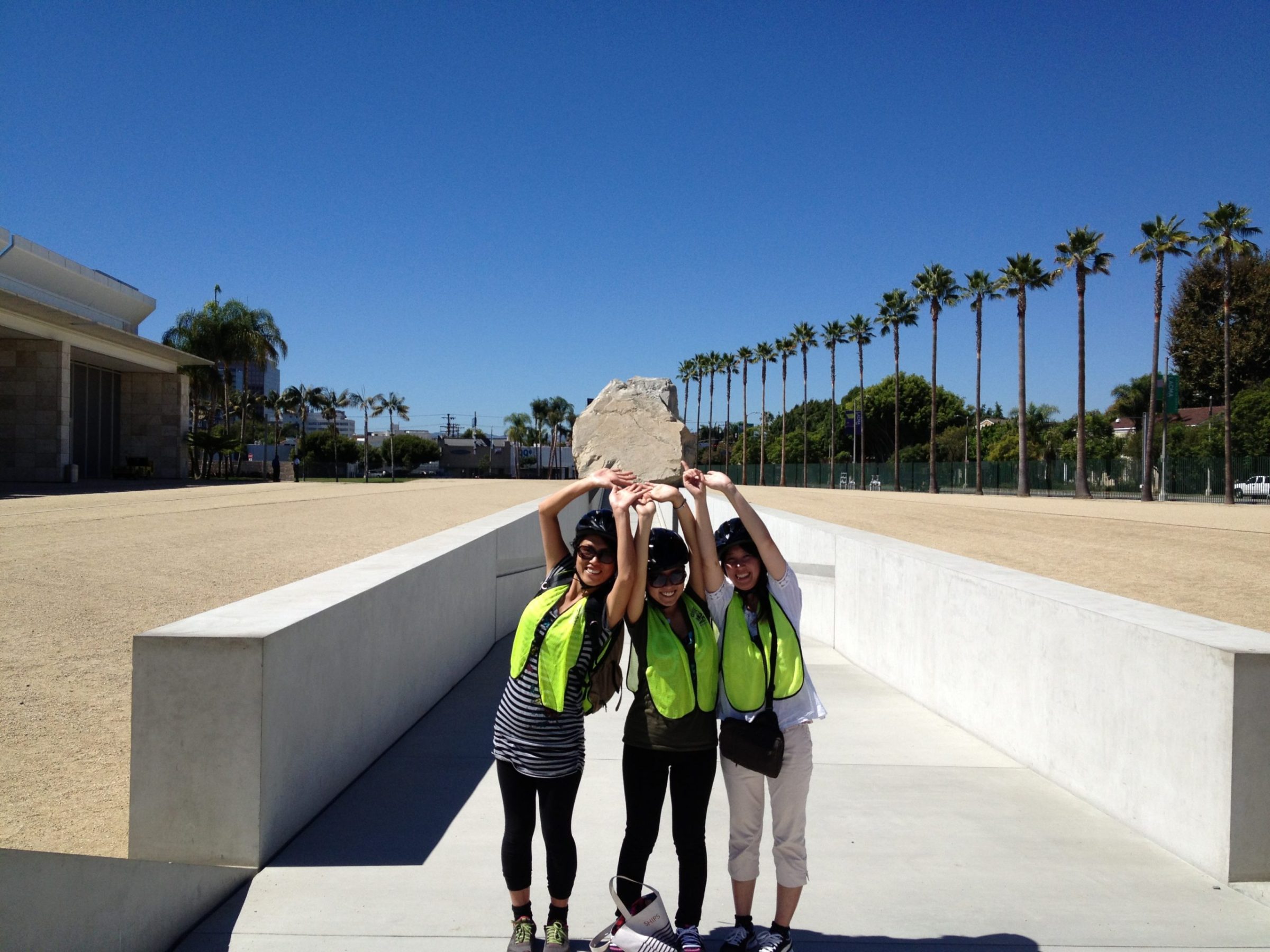 group of people at the la brea tar pits in los angeles