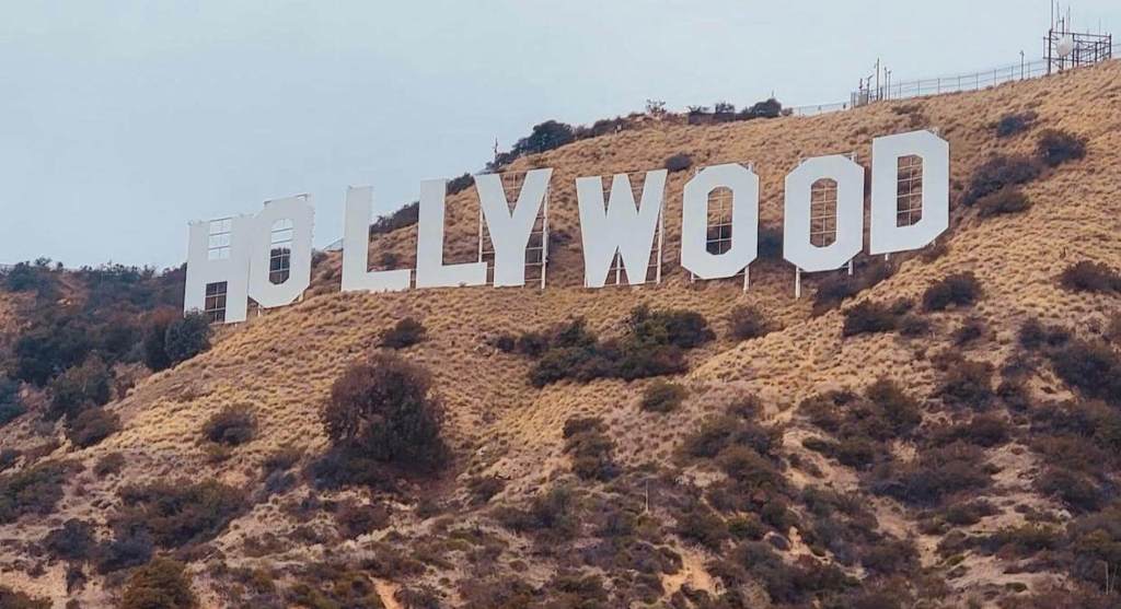 a photo of the hollywood sign and the hill surrounding it
