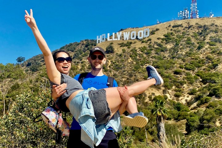 two people taking a hollywood sign tour in los angeles