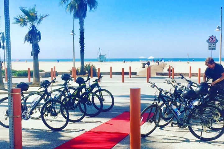 a bicycle parked on a sidewalk