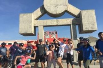 a group of people standing in front of a crowd