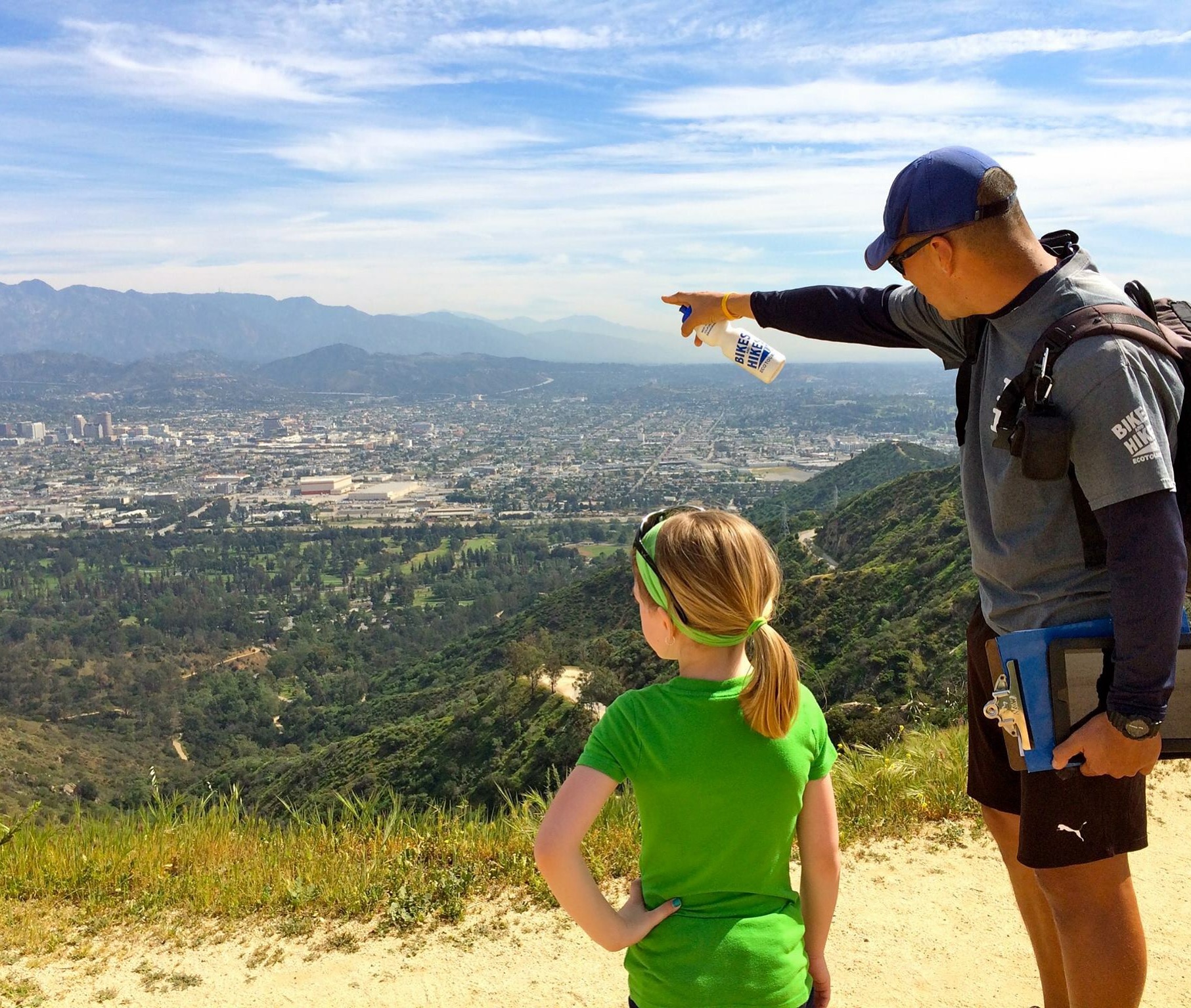Hollywood Hills Hike 12 a man teaches a small child the history of los angeles on a scenic hike tour of the hollywood hills in los angeles