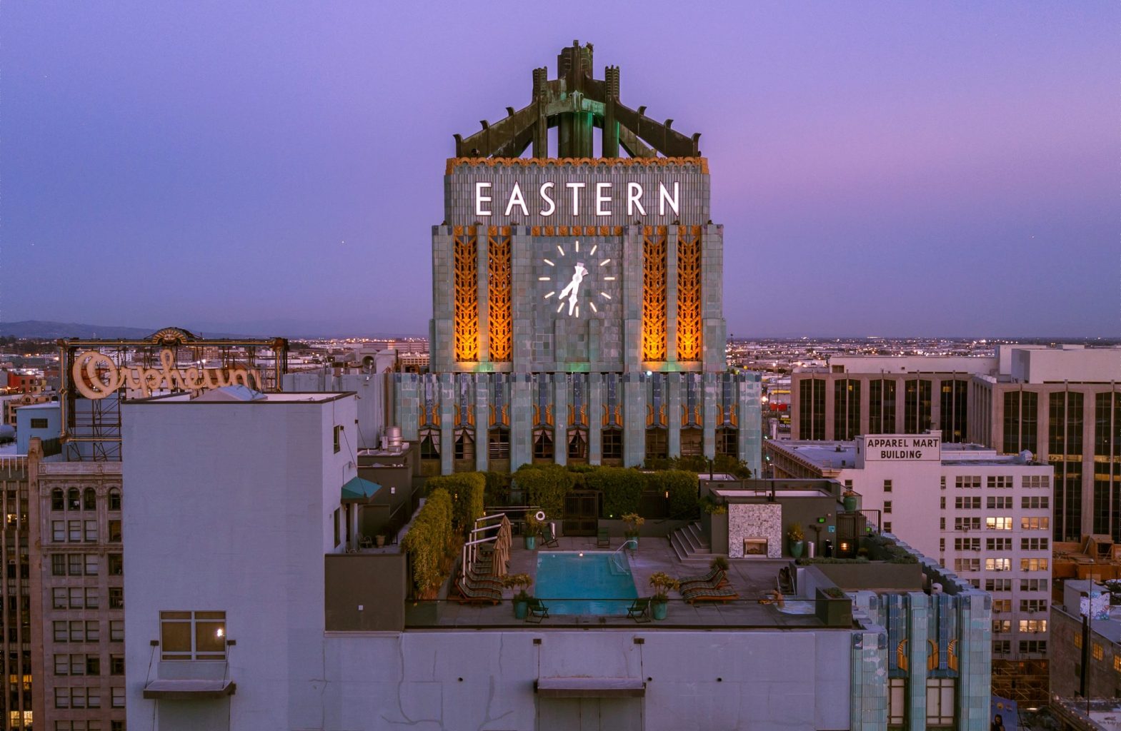 a large clock tower towering over a city