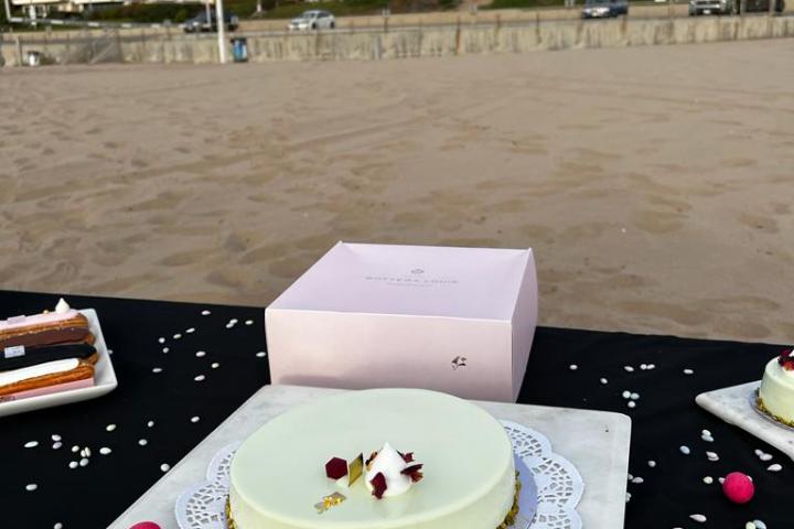 a cake sitting on top of a picnic table