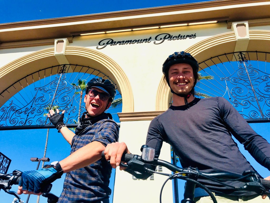 two people outside of paramount studios on a hollywood city tour