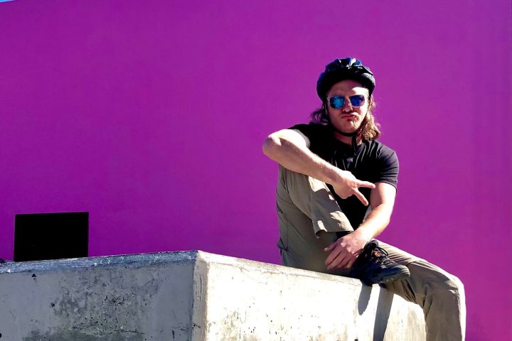 Posing in front of Pink Wall on Mel Rose Hollywood