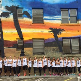 a row of wine glasses on a table