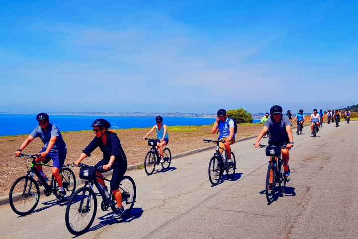 a group of people on a bike tour in los angeles