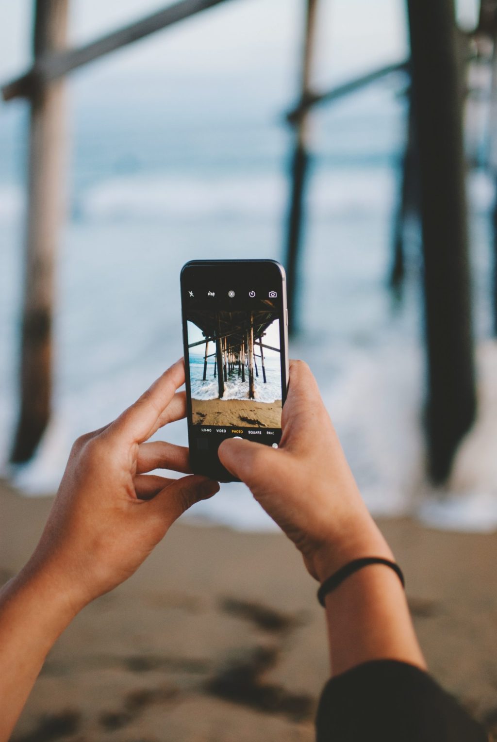 a hand holding a cellphone