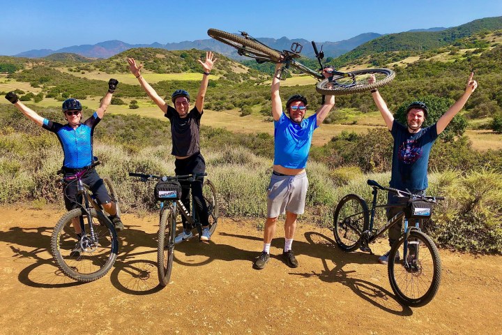 a group of people on a tour of westlake by mountani bike