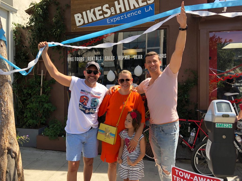 a group of people standing in front of a building