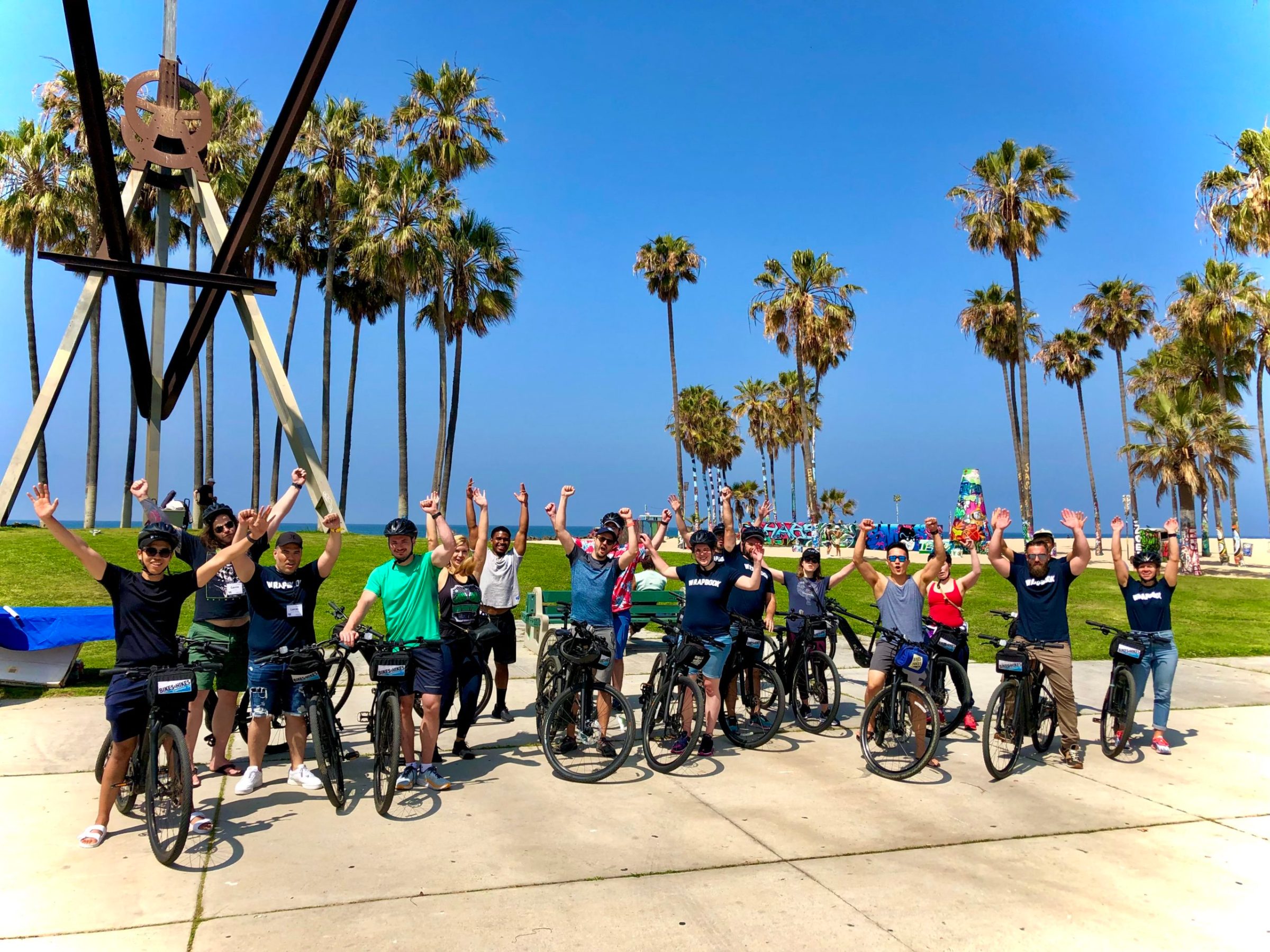 a group of people riding bikes
