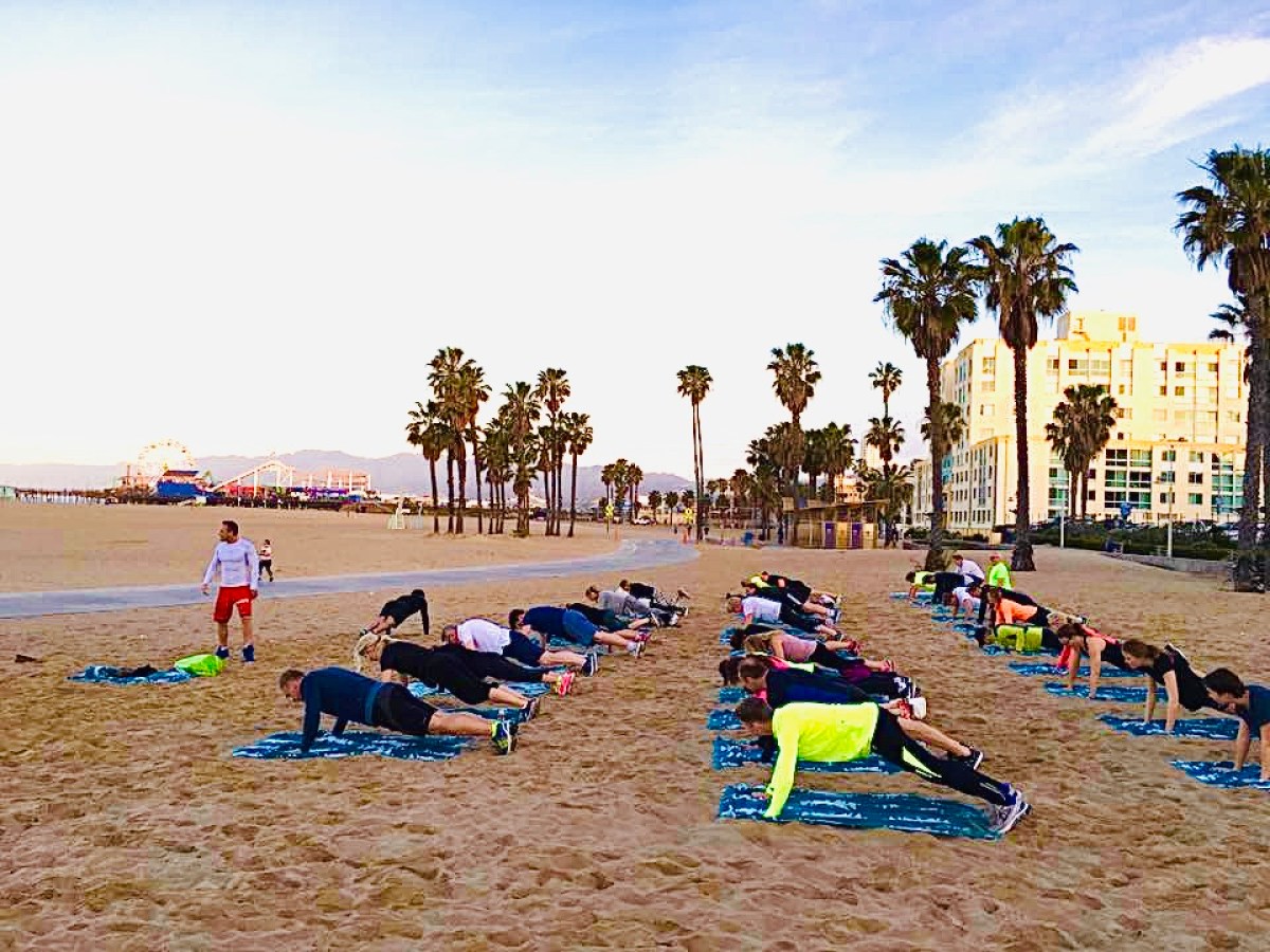 a group of people on a beach