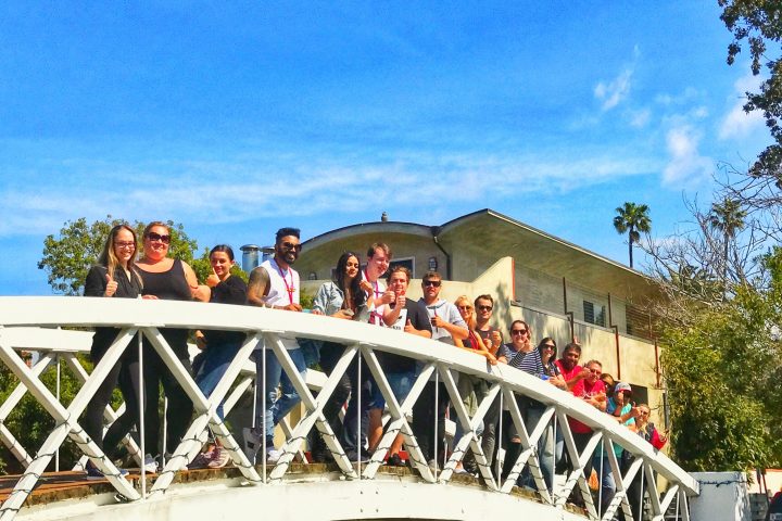 a group of people on a bridge