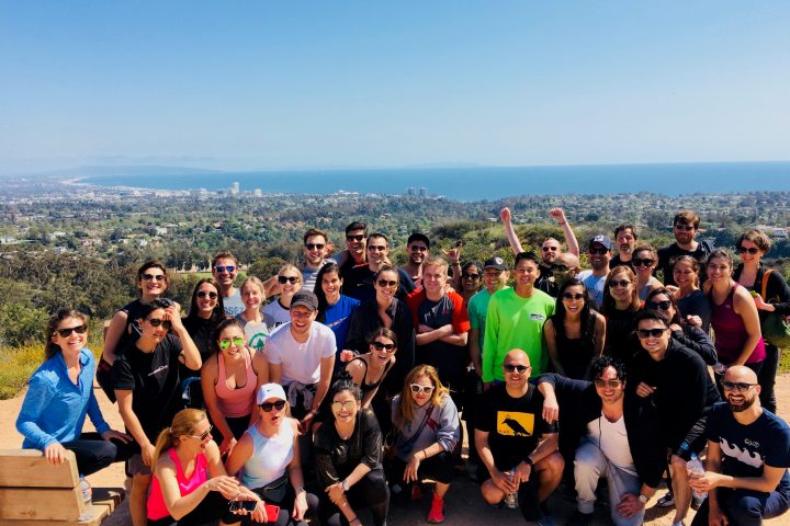 a group of people posing for the camera
