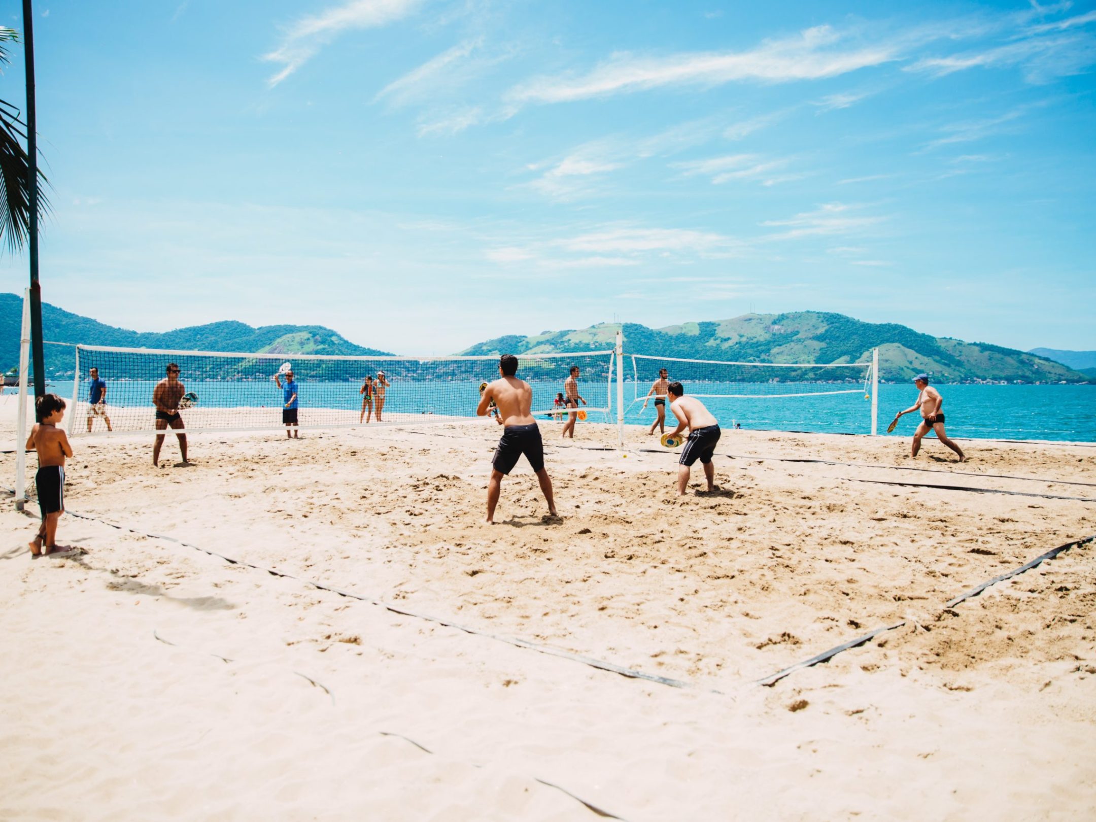 a group of people on a beach
