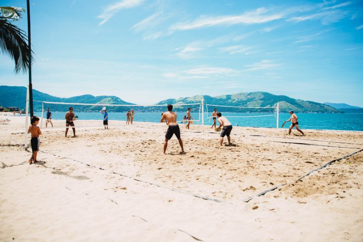 a group of people on a beach
