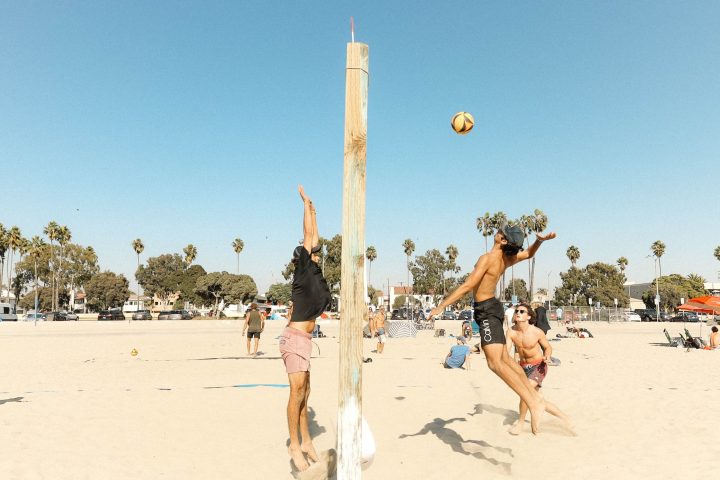 a group of people on a beach