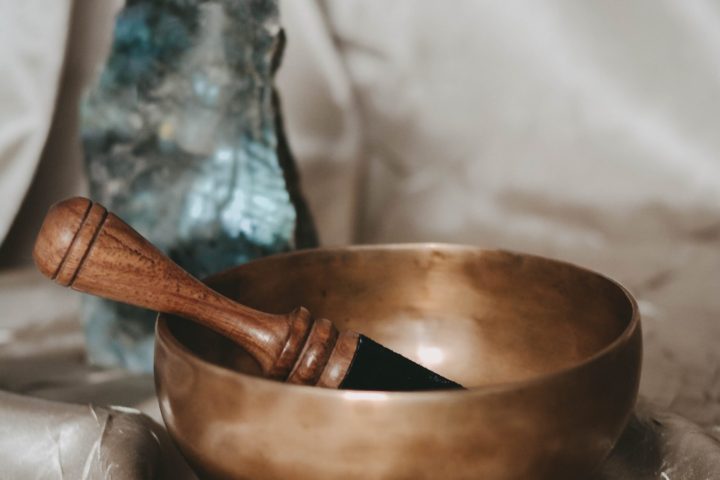 a bowl of food with a knife