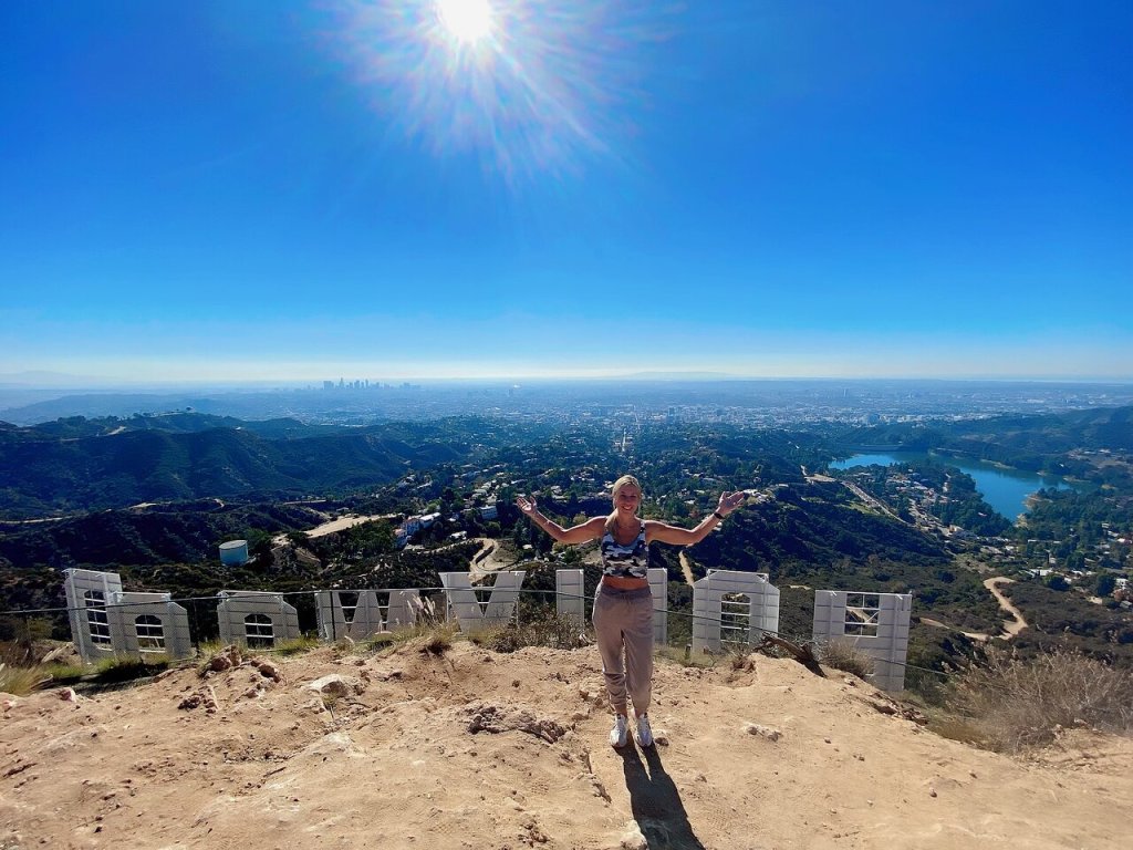 a man standing on top of a mountain
