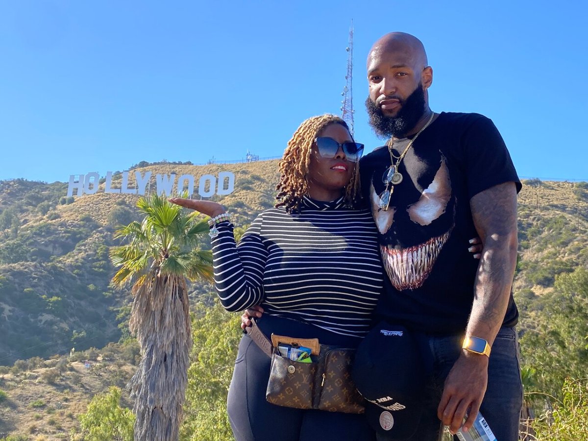 couple on hollywood sign hike in los angeles