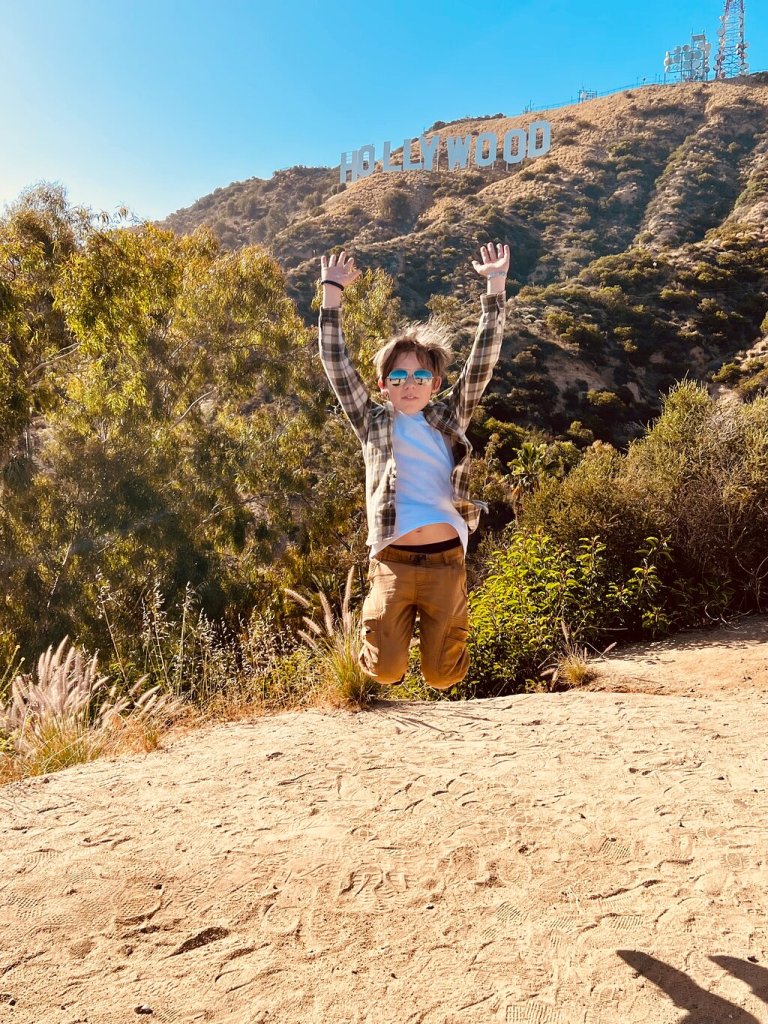 a person walking down a dirt road