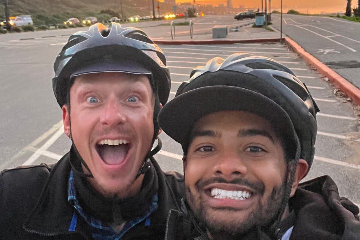 friends riding bikes through LA