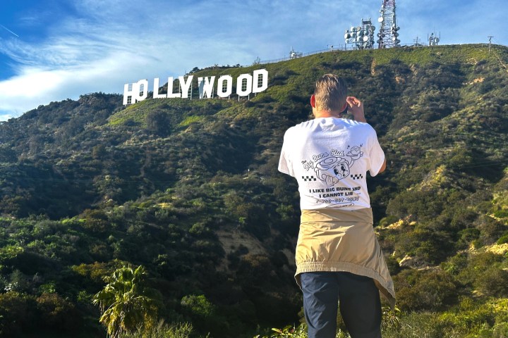 taking a photo of the hollywood sign
