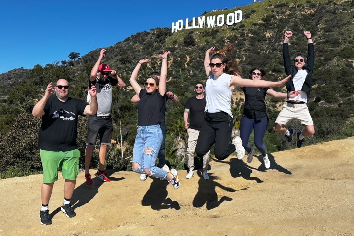 a group of people jumping in the air
