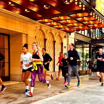 a group of people standing in front of a building