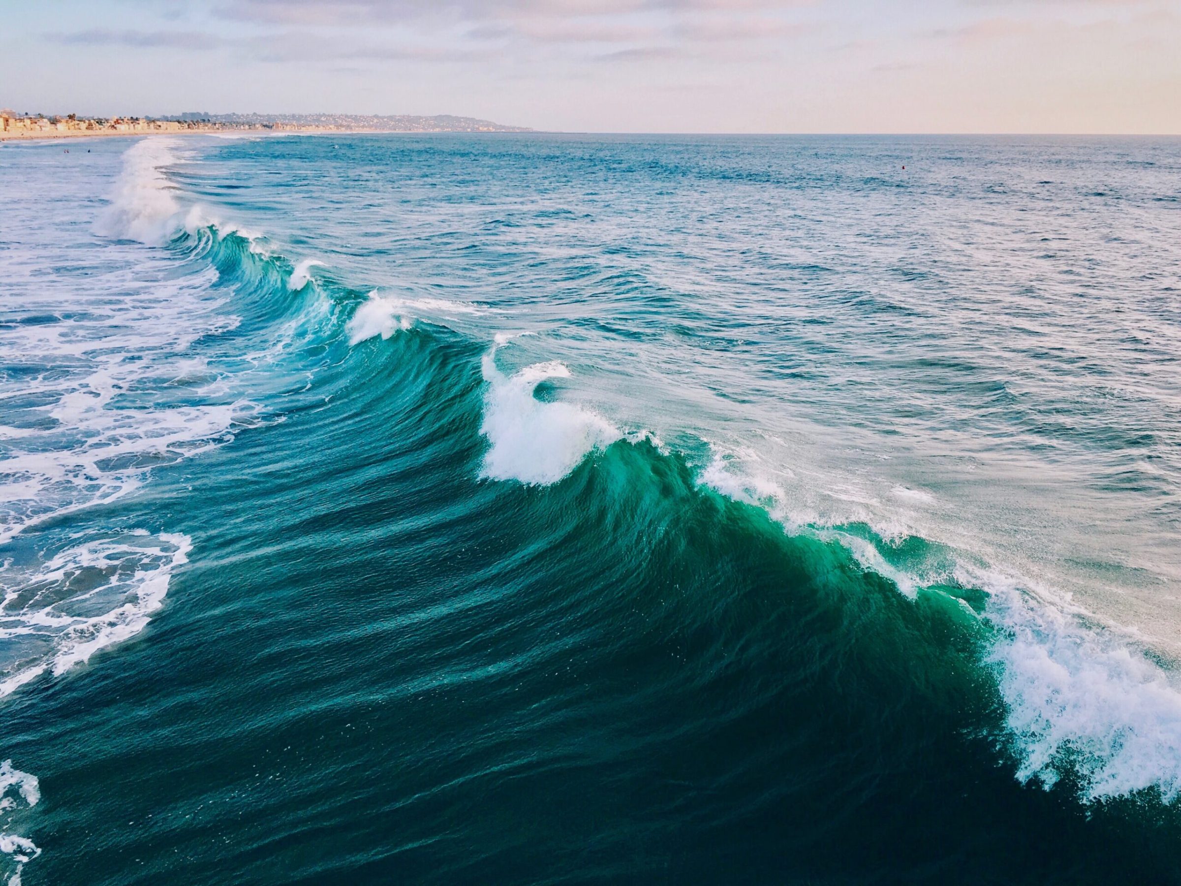 a person riding a wave in the ocean