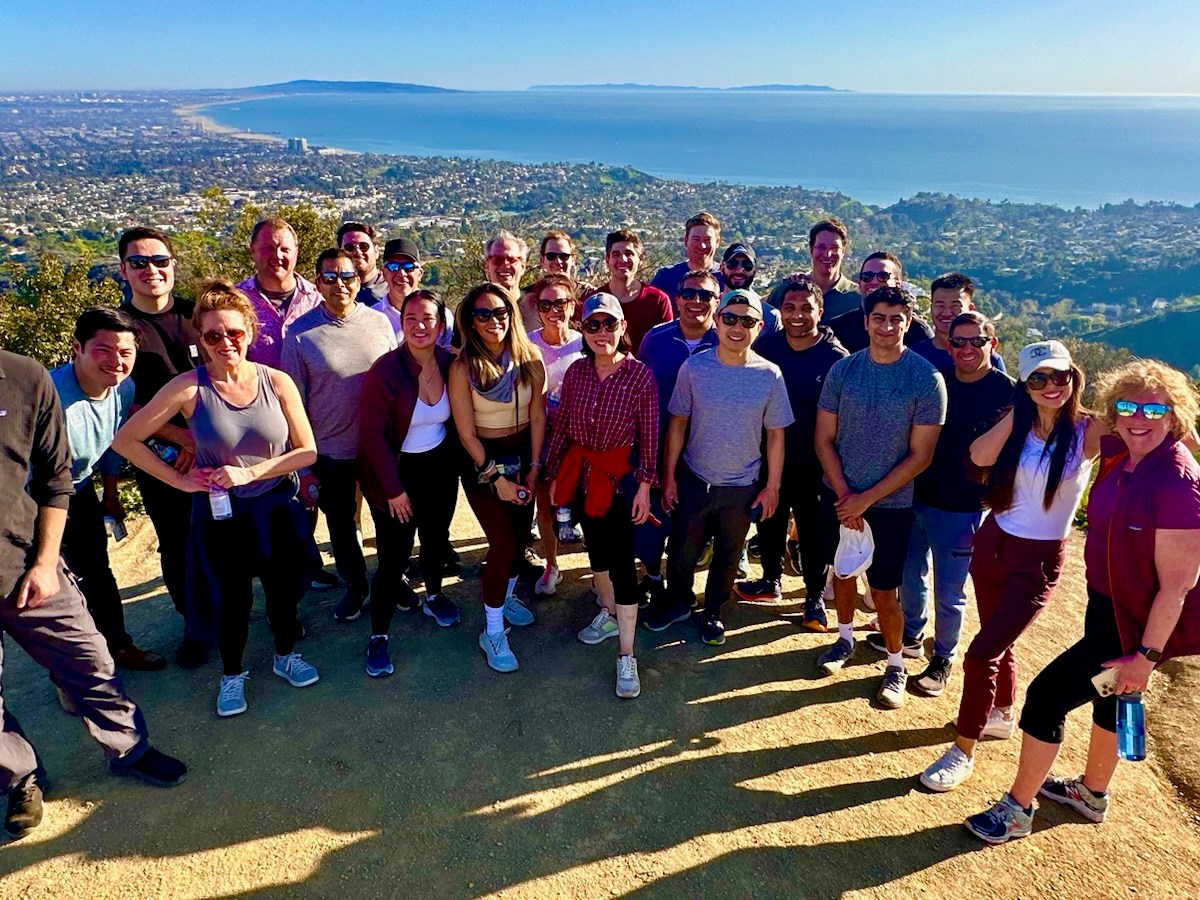 a group of people posing for a photo