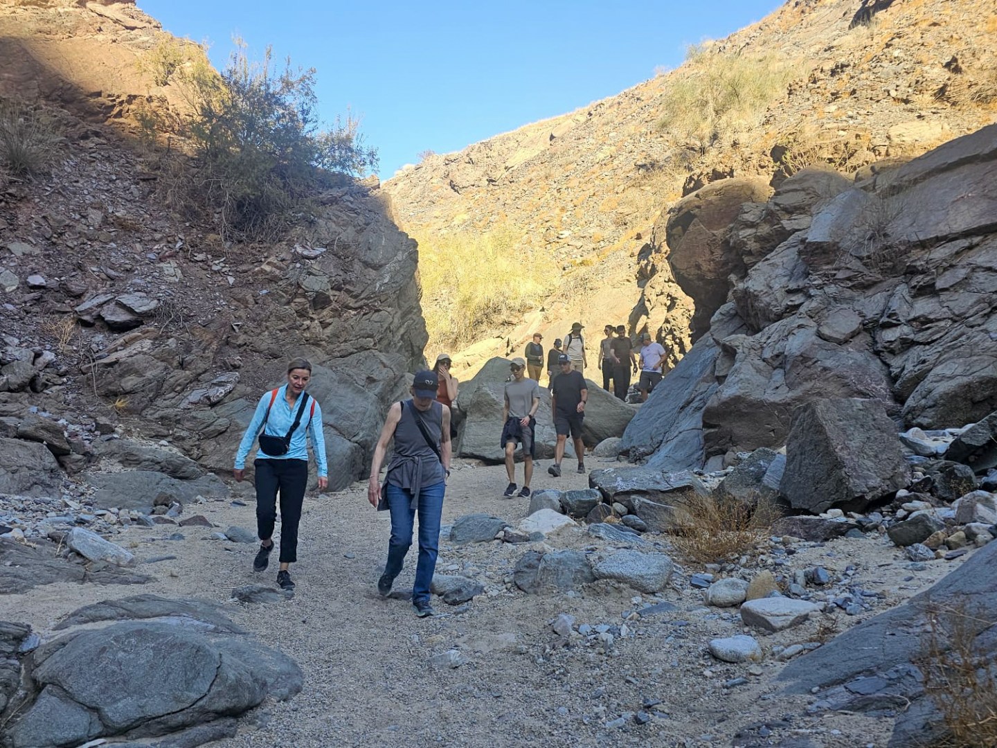 a person standing on a rocky hill