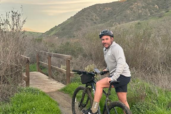a man on a bike tour of orange county