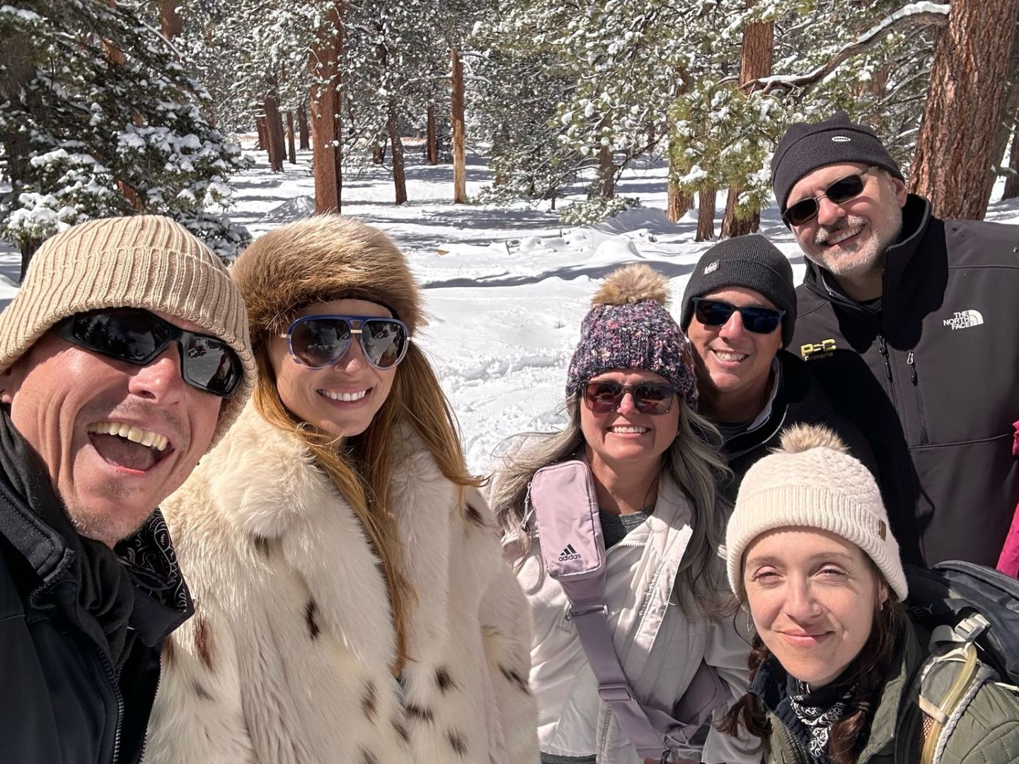 a group of people posing for the camera