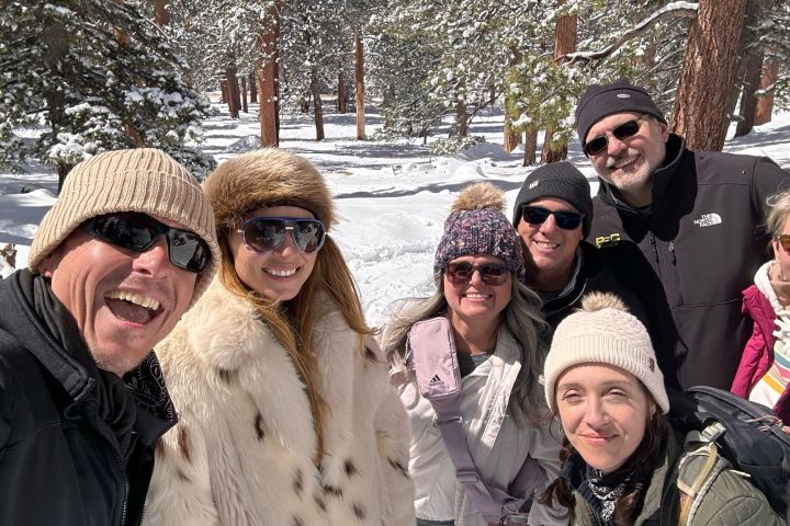 a group of people posing for the camera