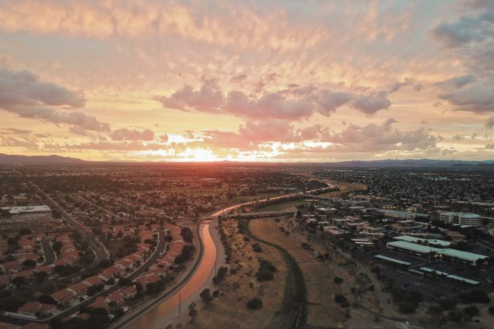 a view of a city at sunset