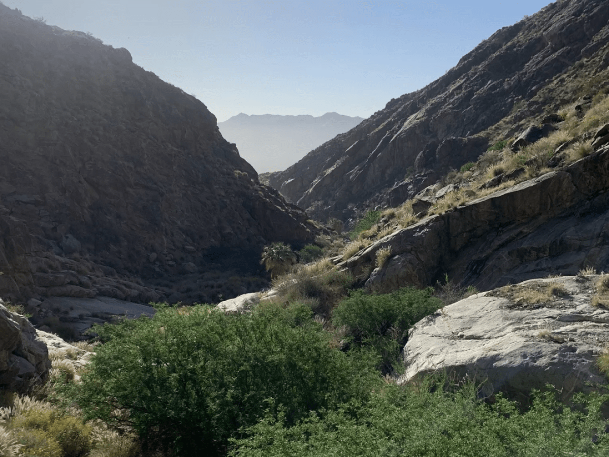 a view of a rocky hill side