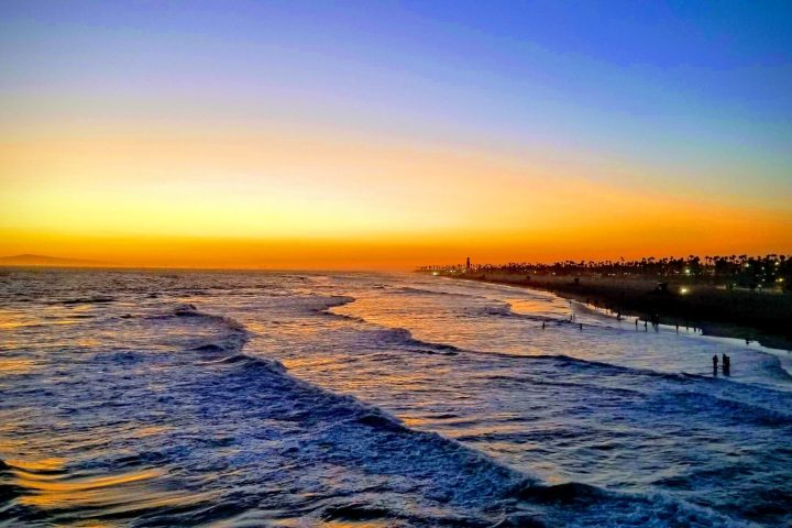 a sunset over a body of water