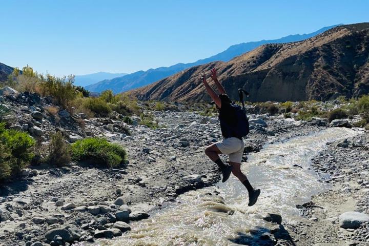 a man taking a palm springs group tour and hiking