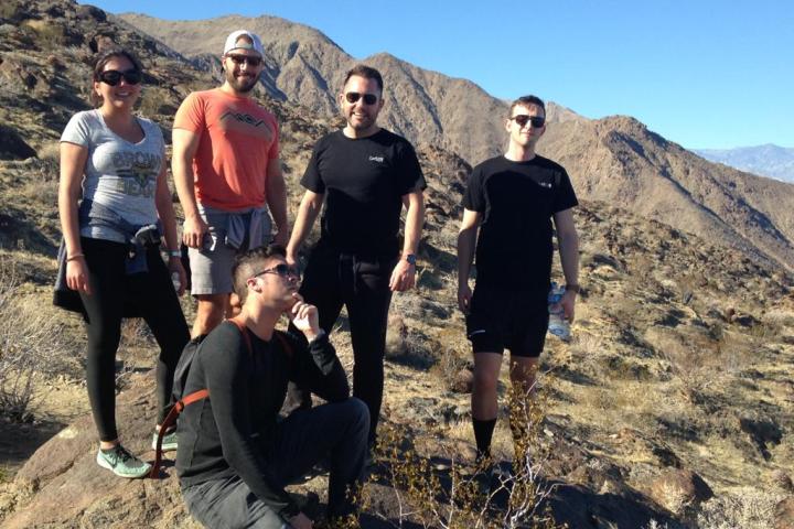 A group of people on the side of a mountain on a palm springs group tour