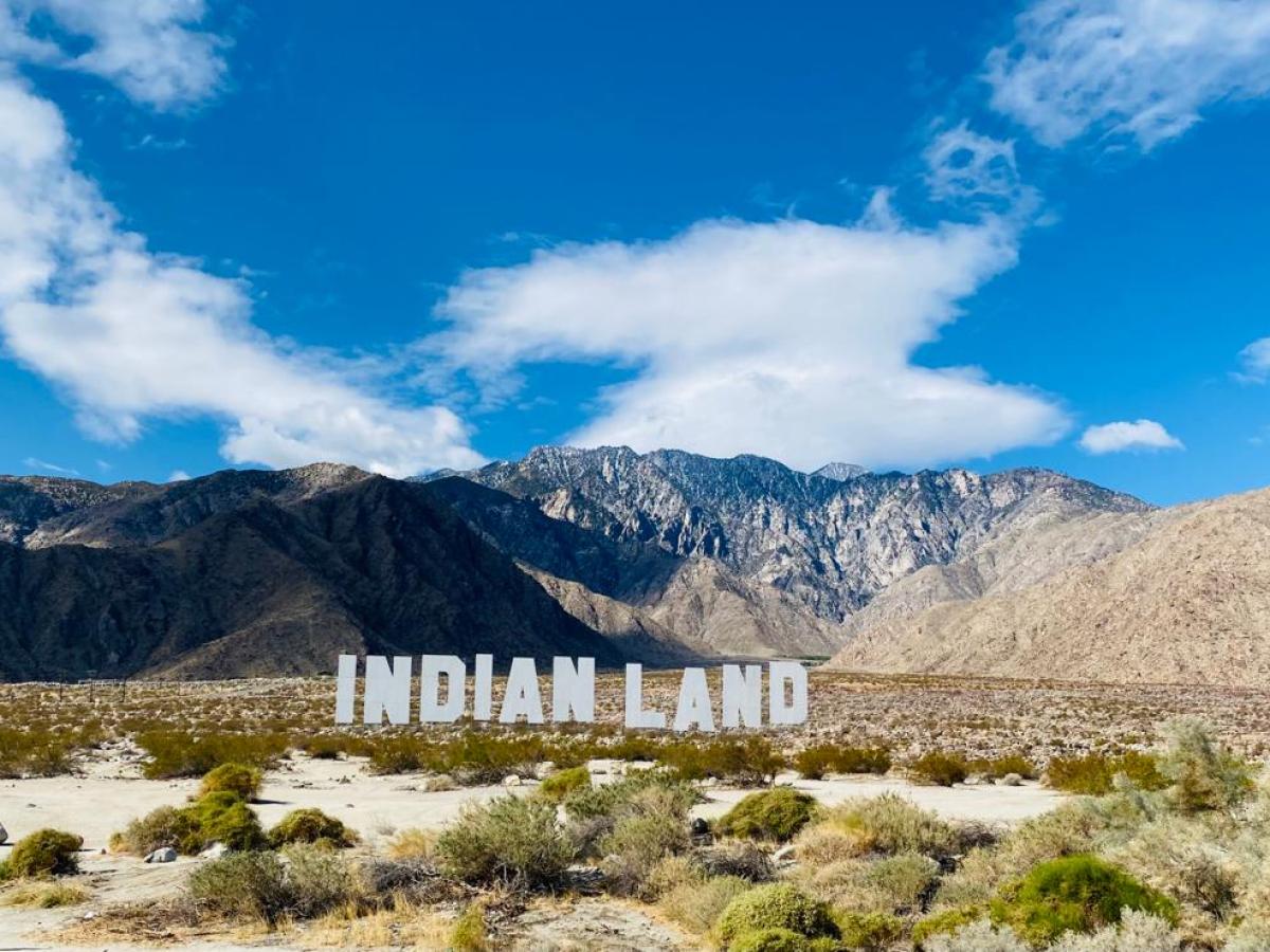 a white sign that reads 