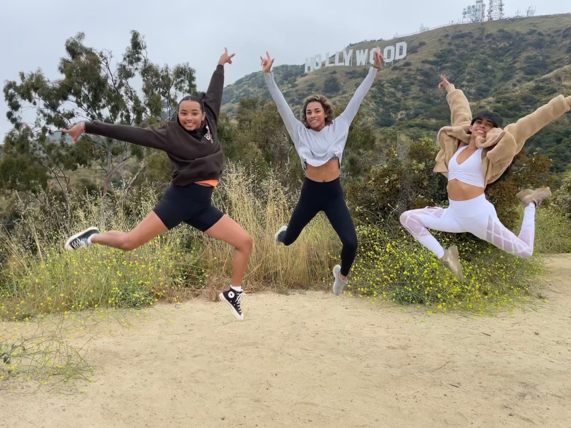 family on the hollywood sign walking tour